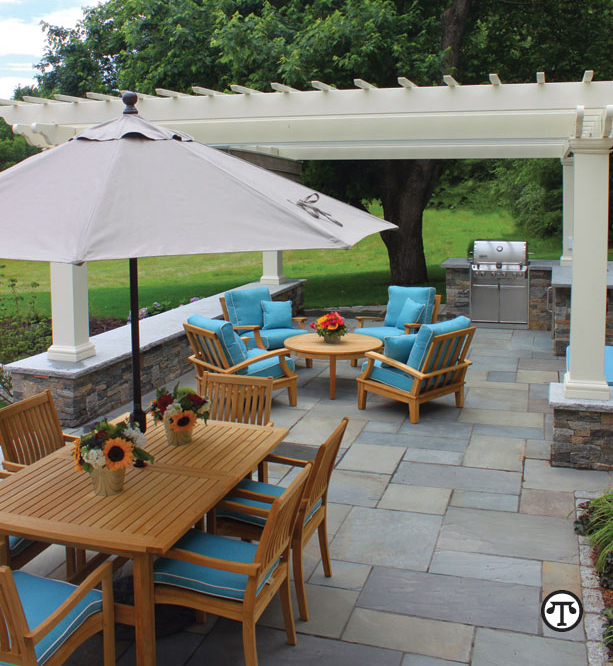 Photo courtesy of Swenson Granite Works Woodbury Gray granite, Boston Blend Ledge thin veneer, full-color natural cleft bluestone pattern pavers.