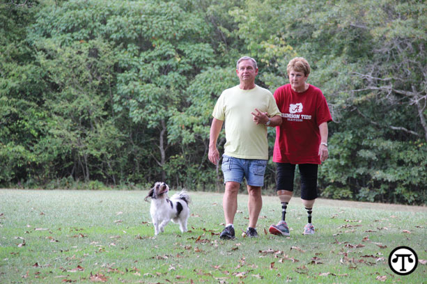 Walking and working out with a partner can help you stick to your schedule—and have more fun, says Gay Rogers, right.