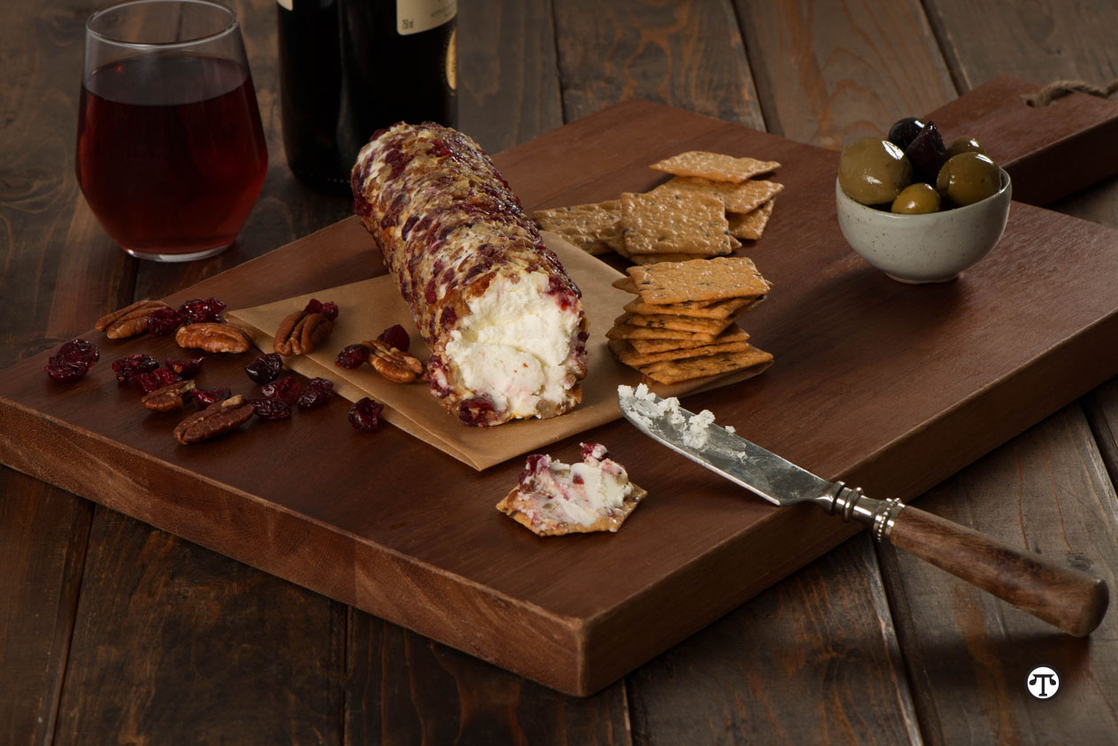 Delight holiday guests with this easy appetizer of goat cheese and Harvest Stone® crackers.