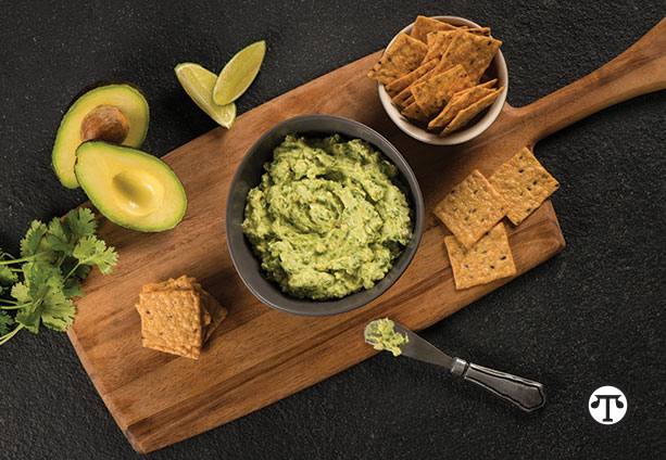 Green Goddess Guacamole makes a great, wholesome dip with Harvest Stone® organic whole grain crackers.