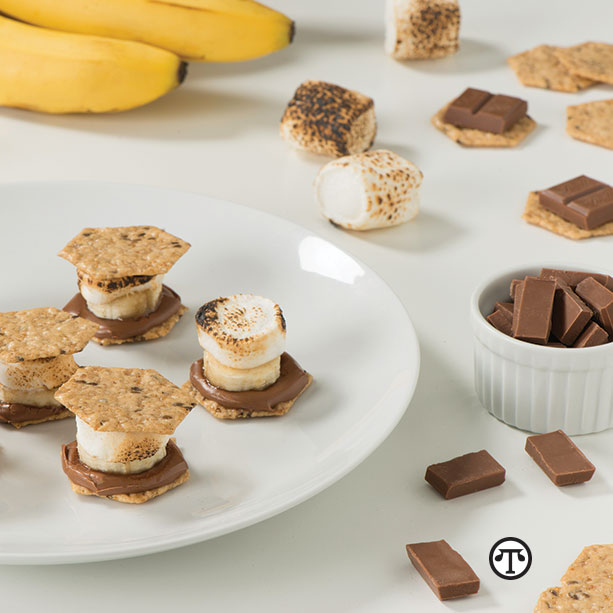 Gluten-free s’mores made with Crunchmaster™ crackers can bring back happy memories.