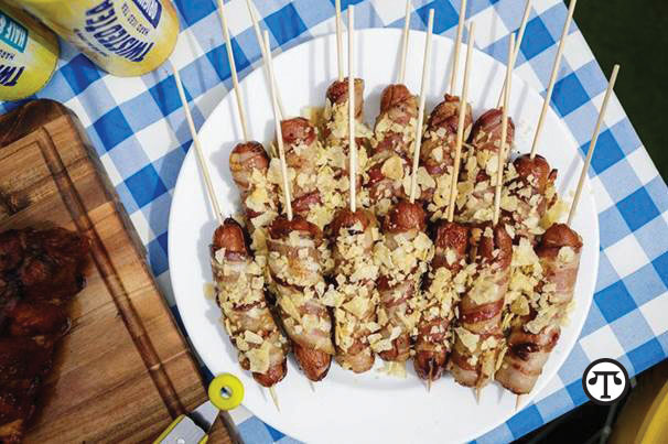 This Twisted Tea Candied Bacon-Wrapped Hot Dog combined with Twisted Tea Hard Iced Tea lets you unwind with a twist wherever you are!