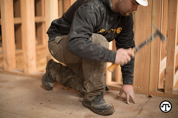 New styles of work pants improve wearers’ range of motion where they need it most. 